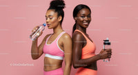 Fit Women in Stylish Sportswear Staying Hydrated