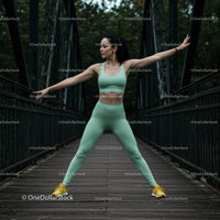 Woman Practicing Yoga Pose on a Bridge in Athletic Wear
