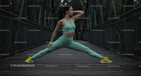 Woman Performing Yoga Pose on Wooden Bridge Outdoors