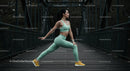 Athletic Woman Practicing Yoga on a Scenic Bridge