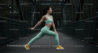 Athletic Woman Practicing Yoga on a Scenic Bridge