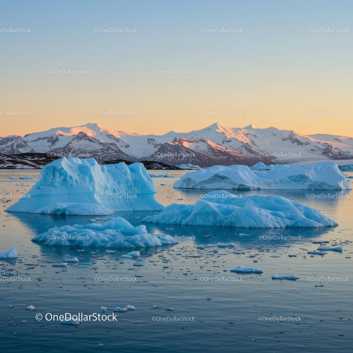 Icebergs and Majestic Mountains at Sunset