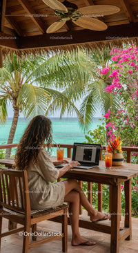 Tropical Remote Work Setup with Ocean View and Lush Foliage
