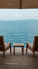 Tranquil Oceanfront Terrace with Wooden Seating