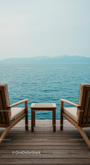 Tranquil Seaside Deck with Ocean View and Wooden Chairs