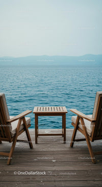 Relaxing Seaside View with Wooden Deck Chairs