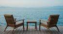 Wooden Chairs Overlooking Serene Ocean Vista