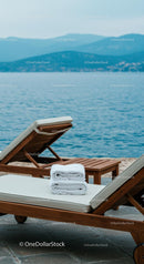 Oceanfront Lounge Chairs with Towels by the Sea