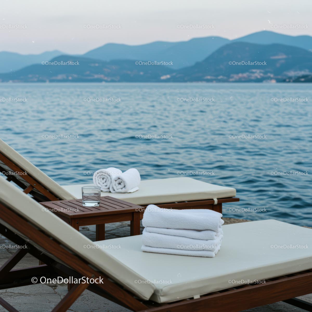 Luxurious Beachfront Loungers Overlooking Serene Sea