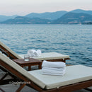 Luxurious Beachfront Loungers Overlooking Serene Sea