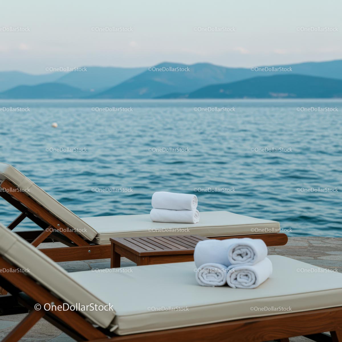 Elegant Wooden Lounge Chairs by the Tranquil Sea
