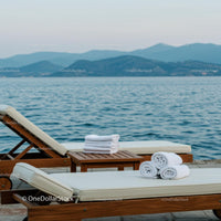 Elegant Sun Loungers by a Tranquil Ocean View