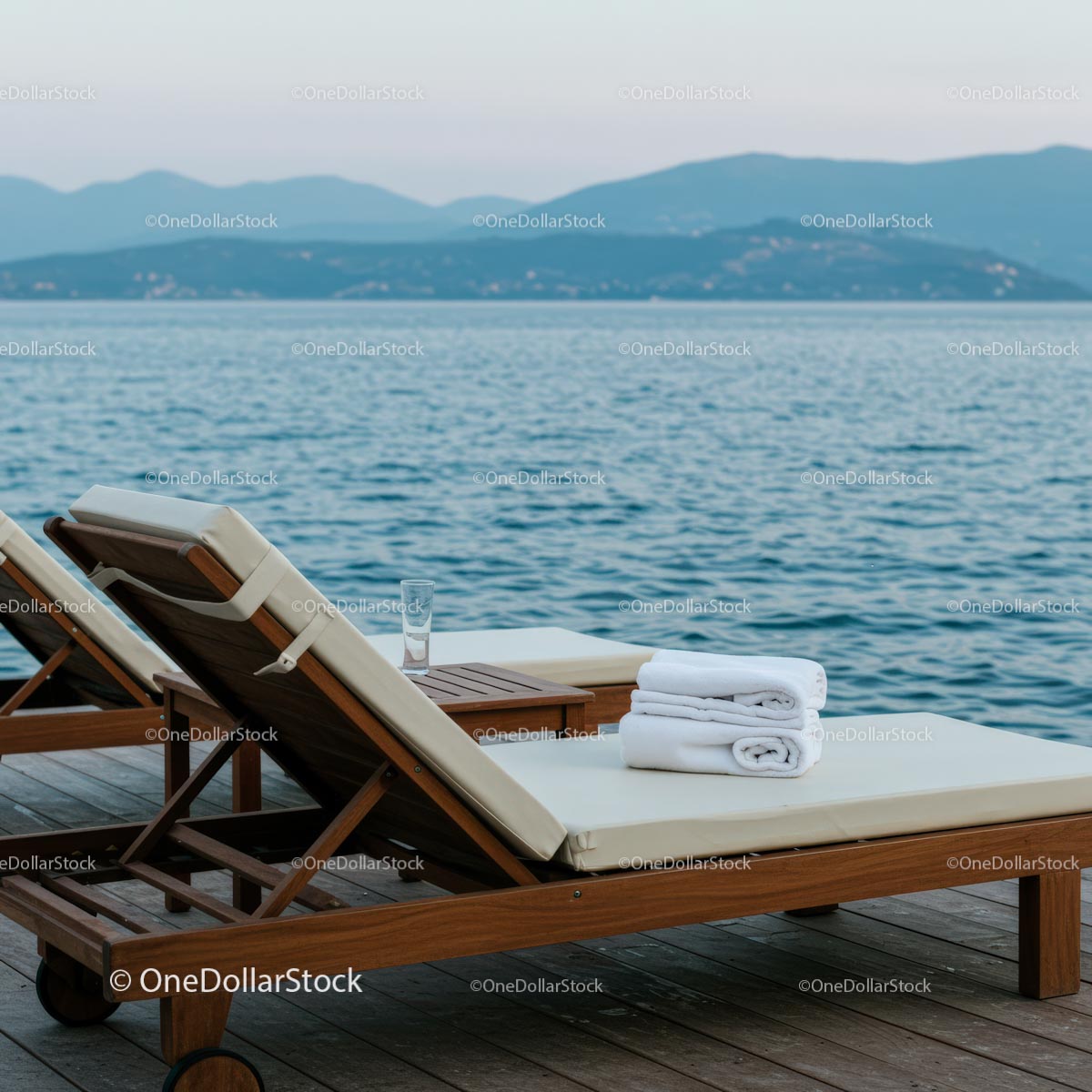 Elegant Deck Chairs Overlooking Serene Ocean