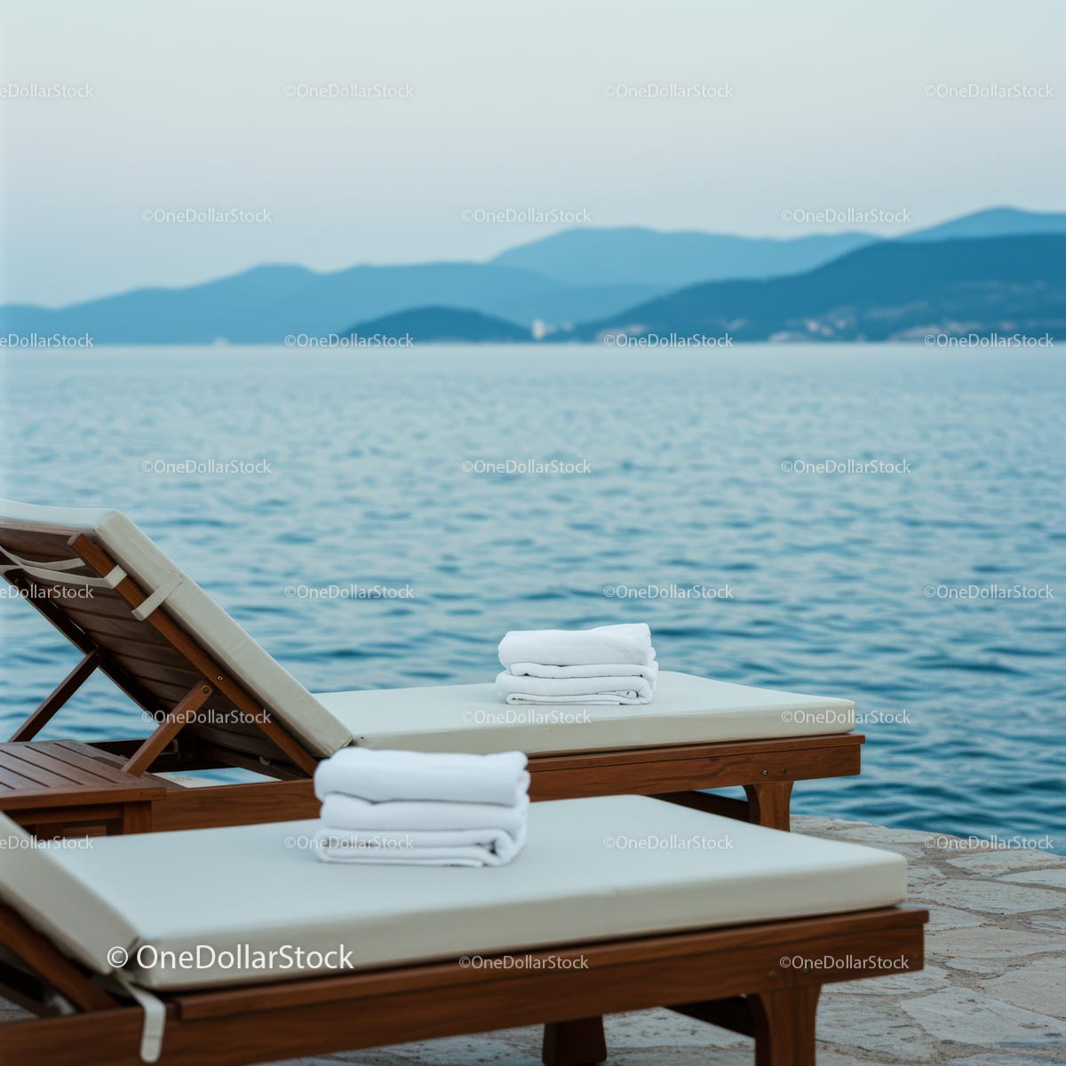 Luxury Lounge Chairs by the Serene Ocean
