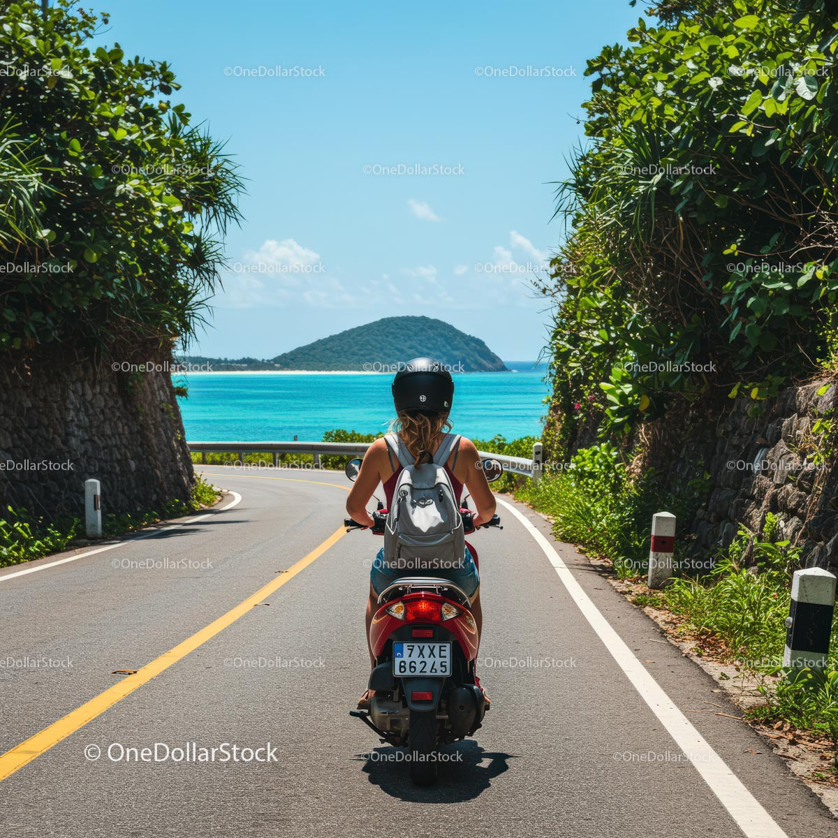 Woman Riding Scooter on Scenic Tropical Island Road