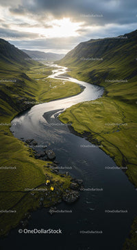 Winding River through a Green Valley at Sunset