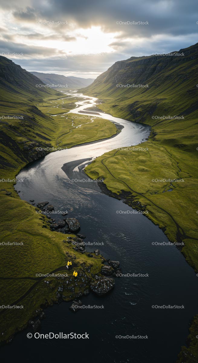 Winding River through a Green Valley at Sunset