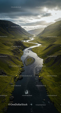Winding River through a Green Valley at Sunset