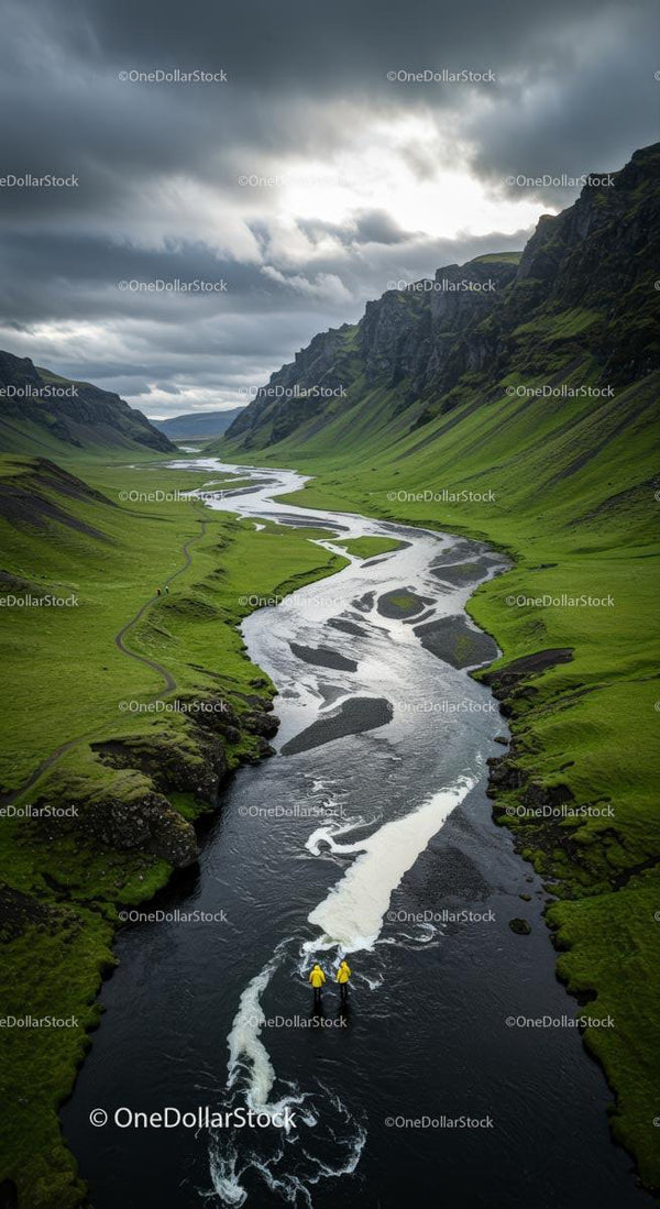Dramatic River Valley with Green Hills and Rocky Cliffs