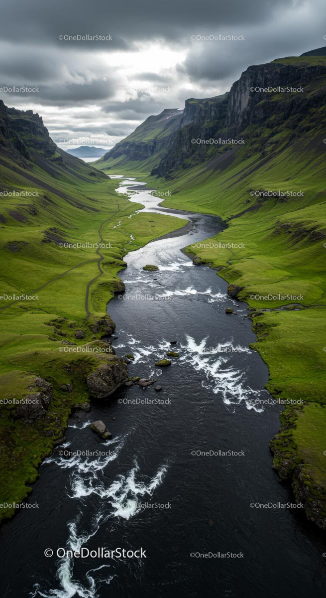 Winding River through a Green Valley at Sunset
