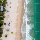 Aerial View of Tropical Beach with Colorful Umbrellas