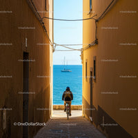 Bicyclist Exploring Narrow Alley Leading to Ocean View