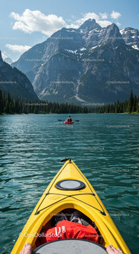 Kayaker Exploring a Stunning Turquoise Mountain Lake