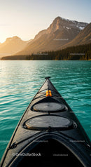 Kayak on Tranquil Lake with Mountain Sunset View