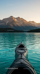 Kayak on Turquoise Lake with Majestic Mountain View