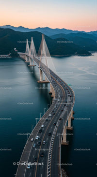 Majestic Suspension Bridge at Twilight Over Calm Waters