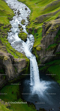 Majestic Waterfall in a Lush Green Valley