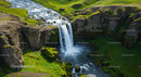 Waterfall Cascading Over Mossy Cliffs in Lush Green Valley