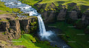 Majestic Waterfall Surrounded by Lush Greenery
