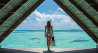 Woman in White Swimsuit Overlooking Tropical Ocean