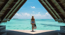 Woman Admiring Turquoise Ocean from Beach Bungalow