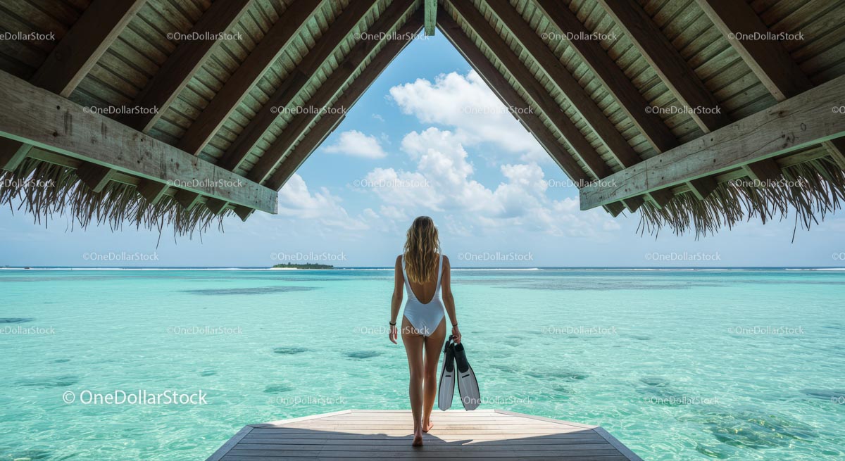Woman in Swimsuit Enjoying Tropical Bungalow View