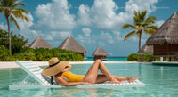 Woman Relaxing Poolside at Tropical Beach Resort