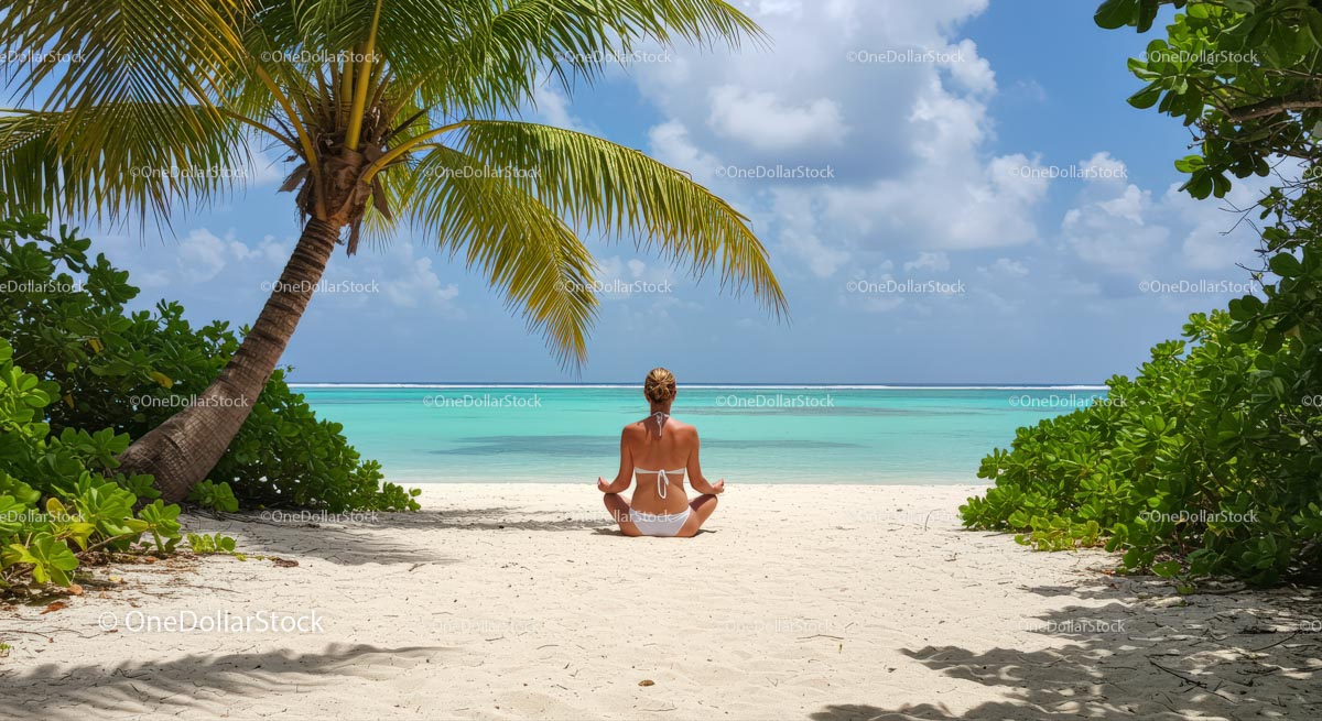 Woman Meditating on Tropical Beach Surrounded by Palm Trees