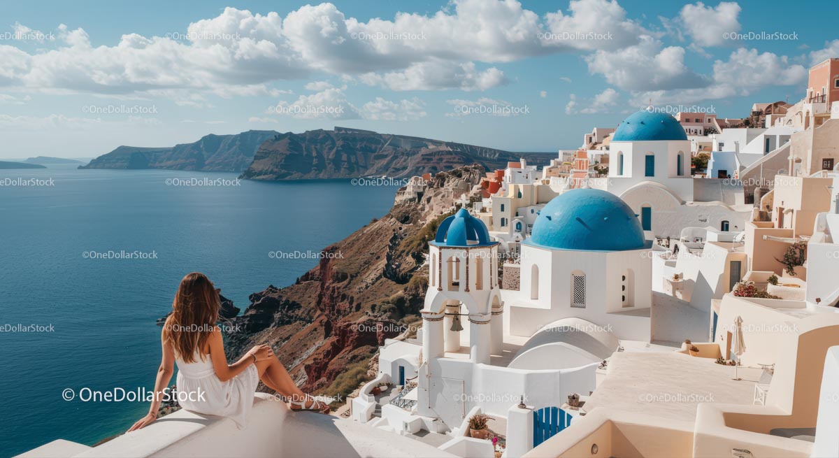 Panoramic View of Santorini's Blue Domes and Sea