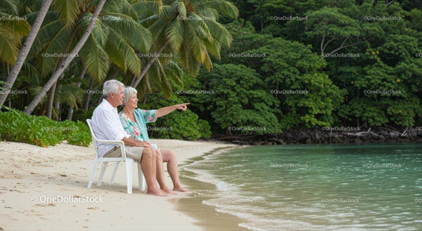 Senior Couple Enjoying a Tropical Beach Getaway
