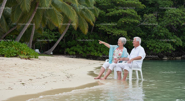 Senior Couple Enjoying a Tropical Beach Getaway