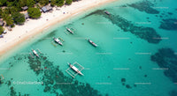Aerial View of Tropical Beach and Turquoise Sea with Boats