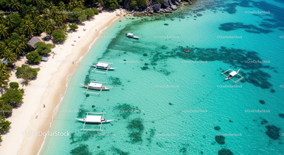 Tropical Beach with Boats and Clear Turquoise Waters