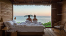 Couple Enjoying Ocean View from Cozy Beachfront Cabin