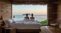 Couple Enjoying Ocean View from Cozy Beachfront Cabin