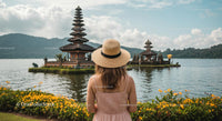 Woman in Hat Admiring Ulun Danu Bratan Temple in Bali