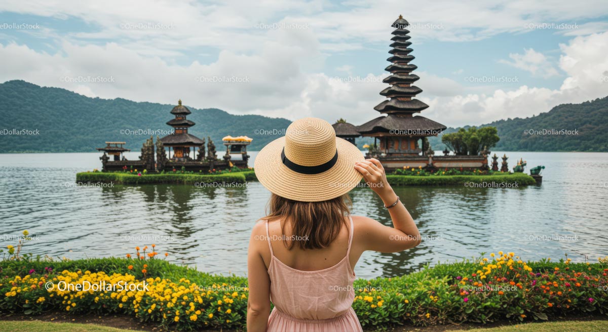 Woman in Hat Admiring Ulun Danu Bratan Temple in Bali