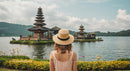 Woman in Hat Admiring Ulun Danu Bratan Temple in Bali