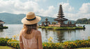 Woman in Hat Admiring Ulun Danu Bratan Temple in Bali