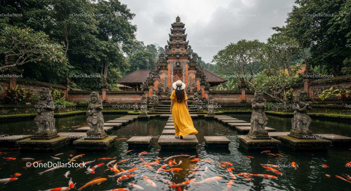 Woman in Yellow Dress at Bali Temple with Koi Fish Pond
